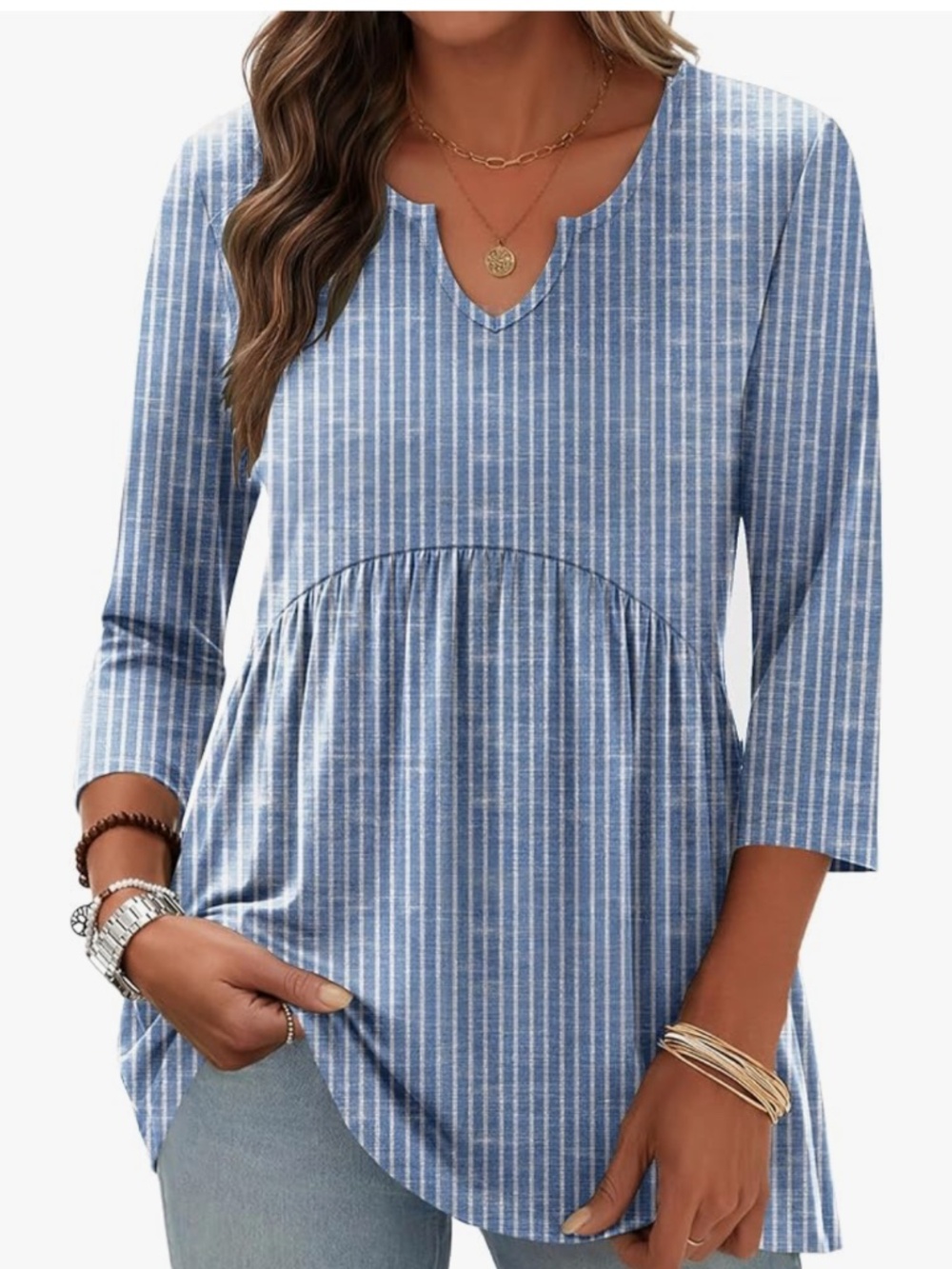Recycled Polyester top with a relaxed babydoll silhouette. Lightweight f
